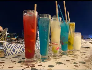 cocktails on a bar at night in a rooftop bar in pattaya