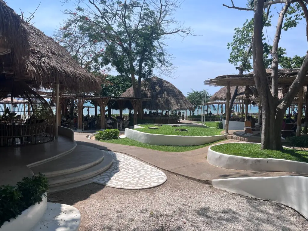 A breathtaking sunset view from The Oxygen Beachside Oasis, with the ocean glowing in warm hues