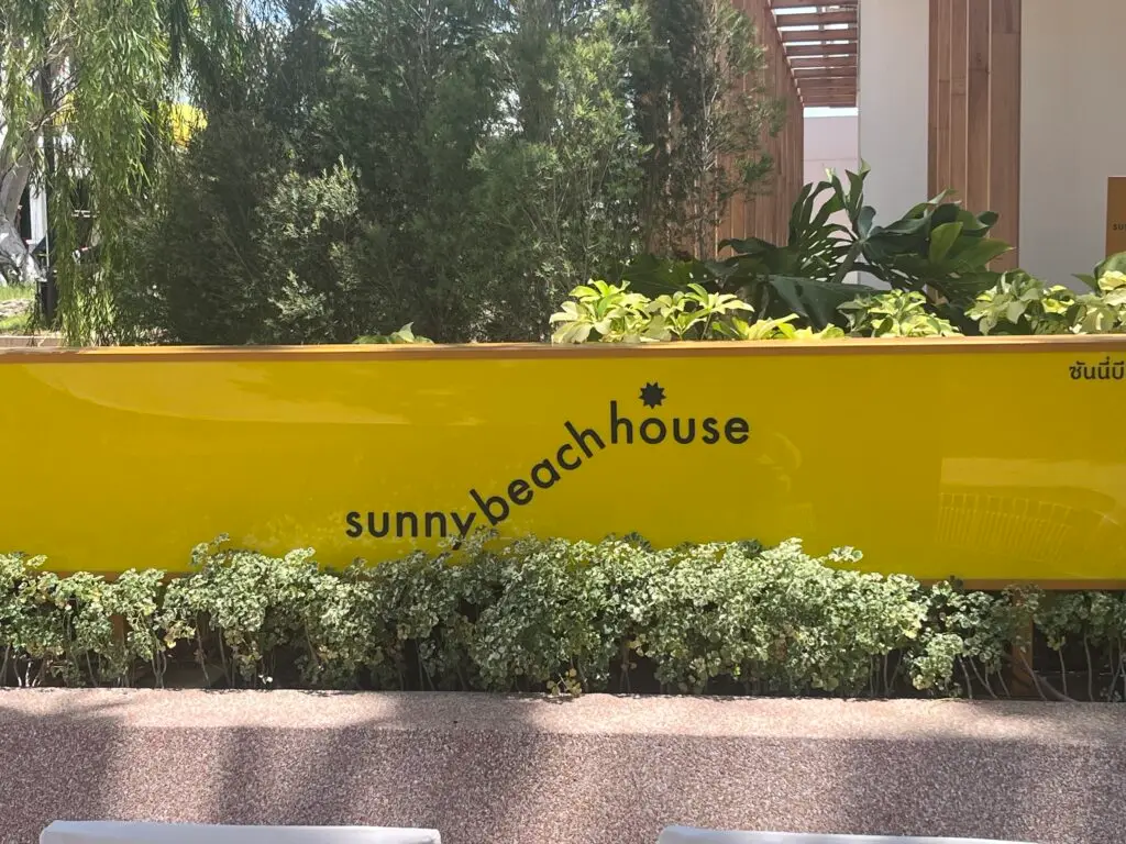 sunny beach house signage, a great beachside cafe in pattaya