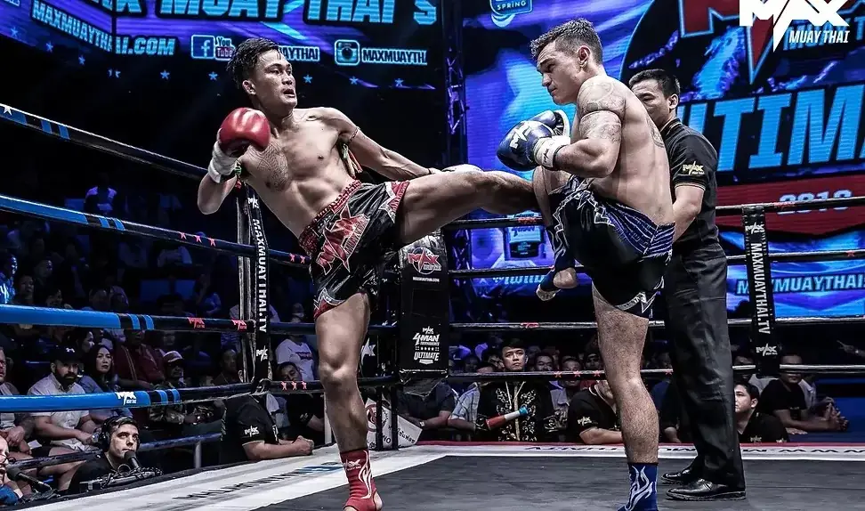 2 may Thai fighters exchange kicks in Pattaya stadium,
