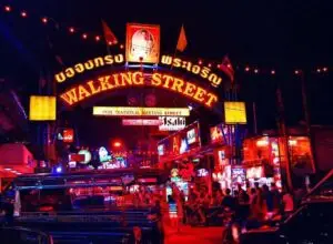 the iconic sign above the entrance to walking street in pattaya