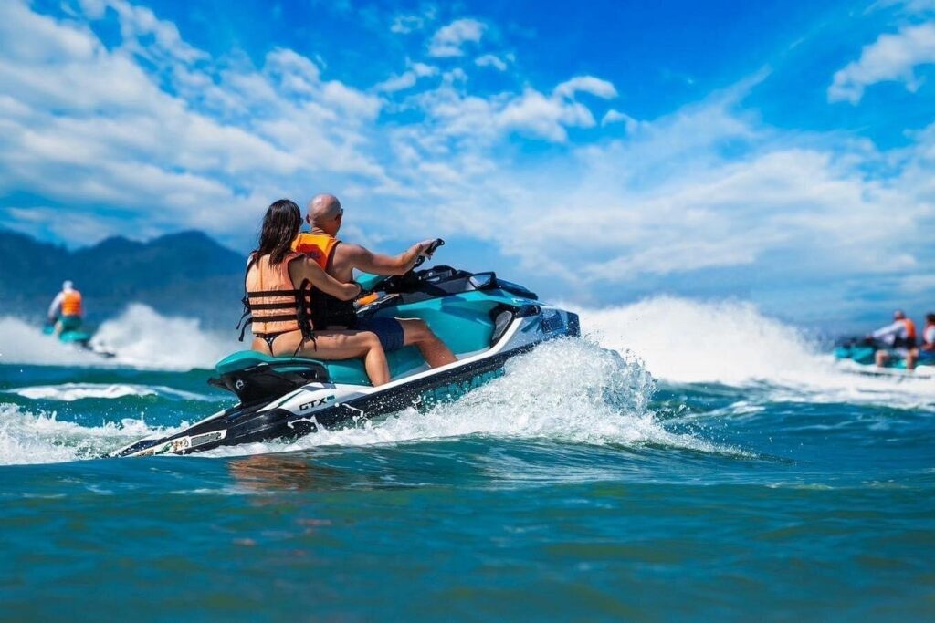 jetskis bouncing across the waves on a jet ski safari in pattaya